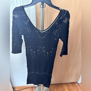 Bebe bodycon dress size Medium. Colors black and cream